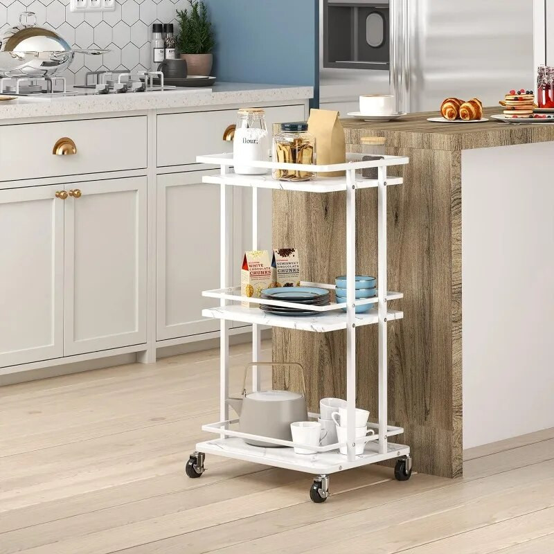Compact white rolling cart used in a kitchen island near a counter